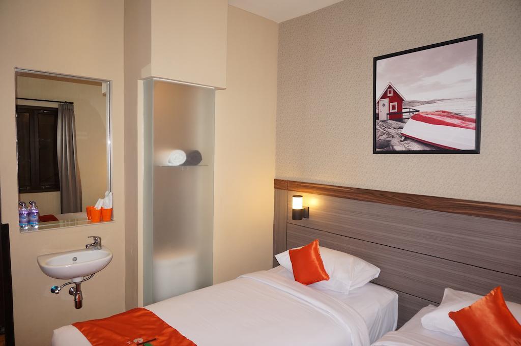 Ekon Hotel Yogyakarta Værelse billede